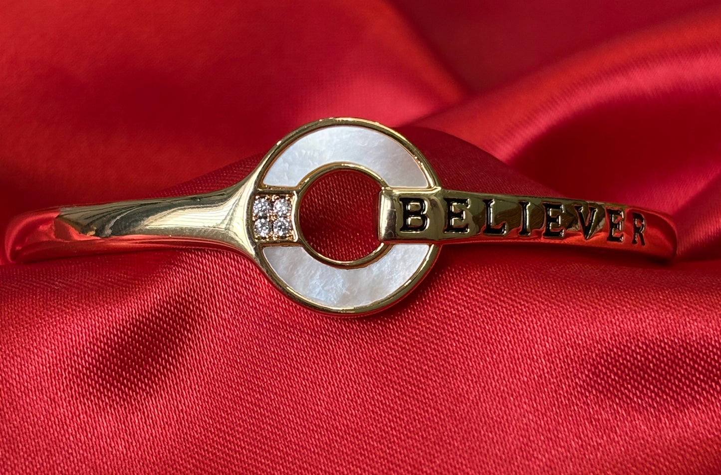 Gold Tone Circular Charm With BELIEVER Bangle