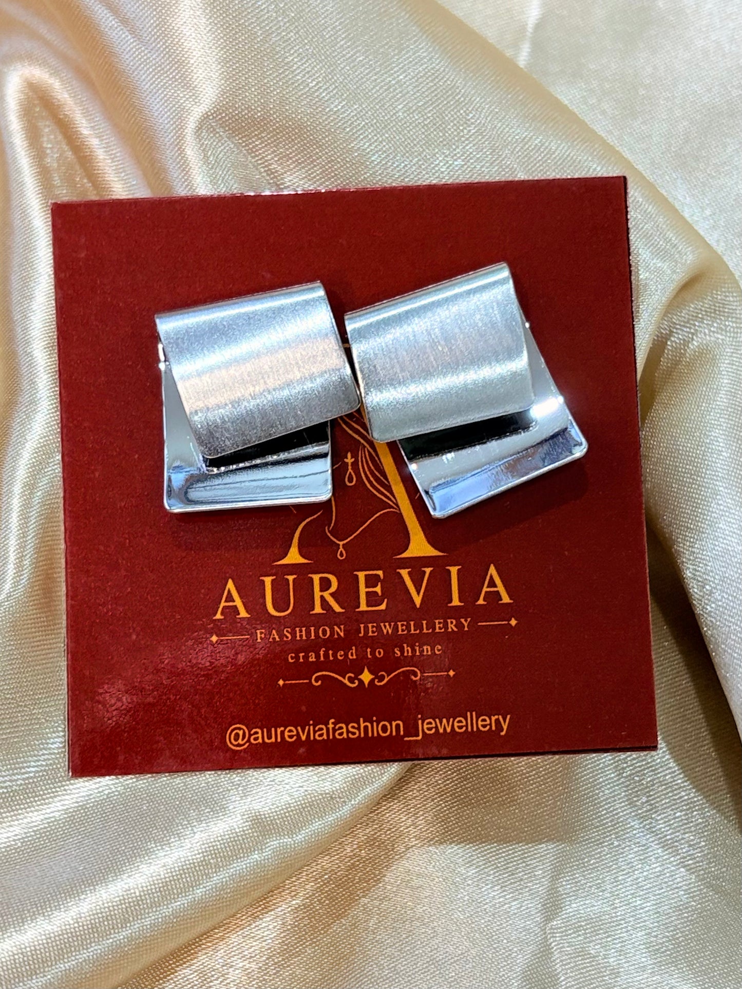 Satin Glow Statement Studs
