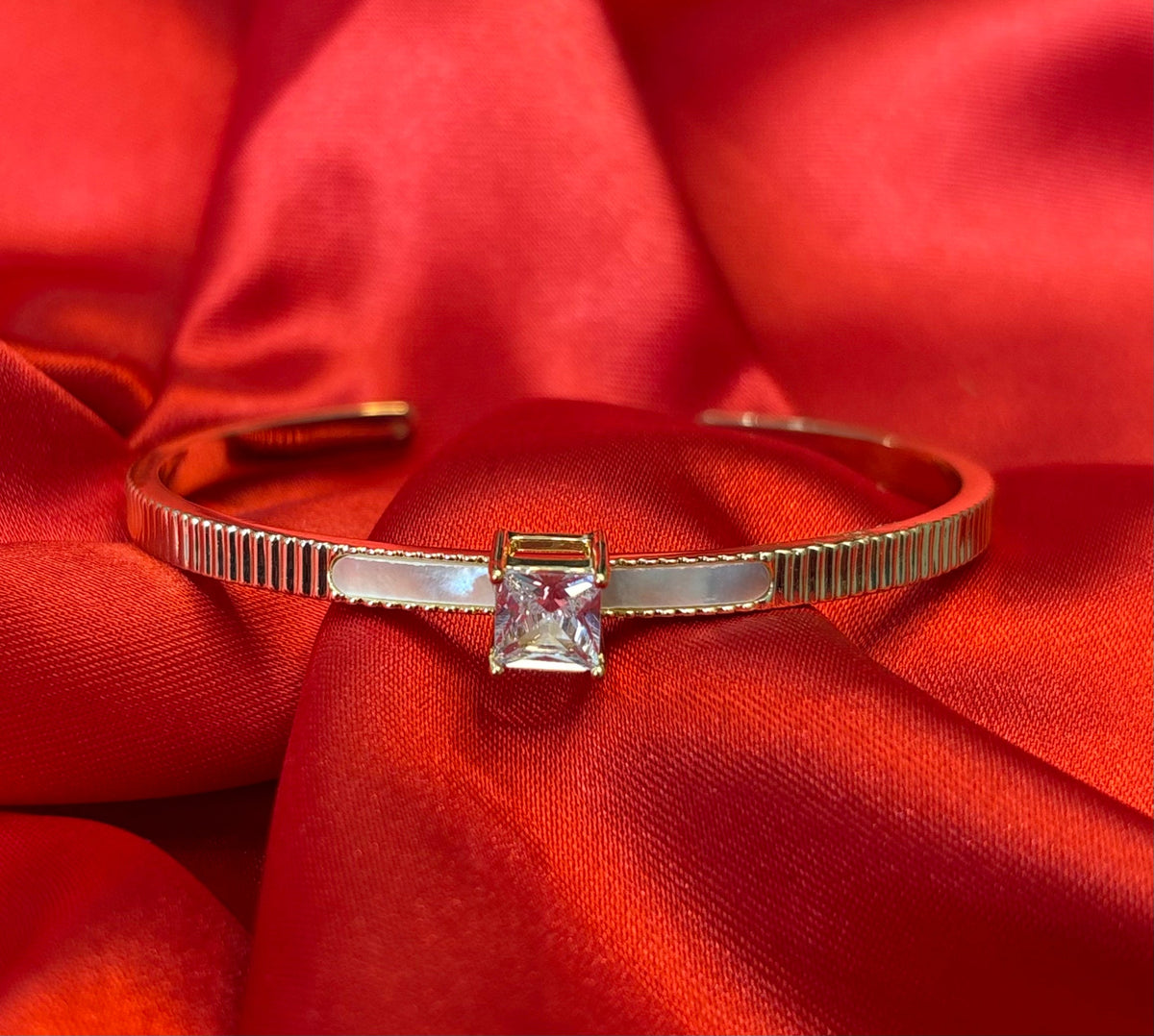 Gold-tone Princess Cut Center Stone Cuff Bangle