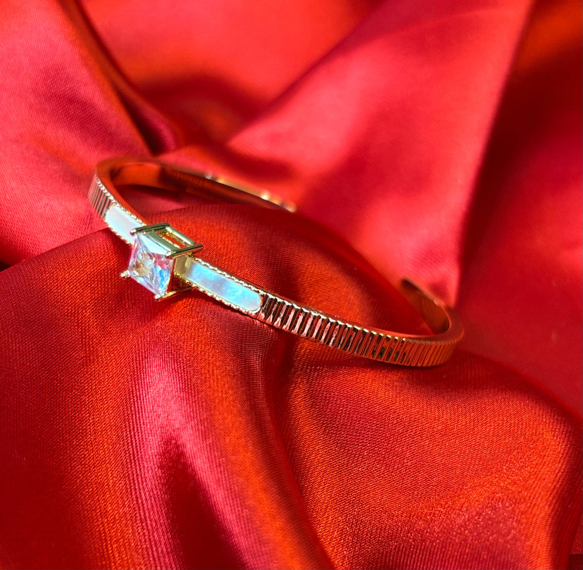 Gold-tone Princess Cut Center Stone Cuff Bangle