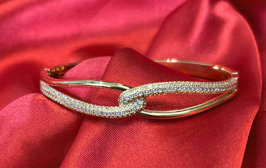 Gold tone kate infinity hinged With cubic zirvonia Bangle