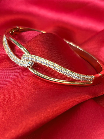 Gold tone kate infinity hinged With cubic zirvonia Bangle