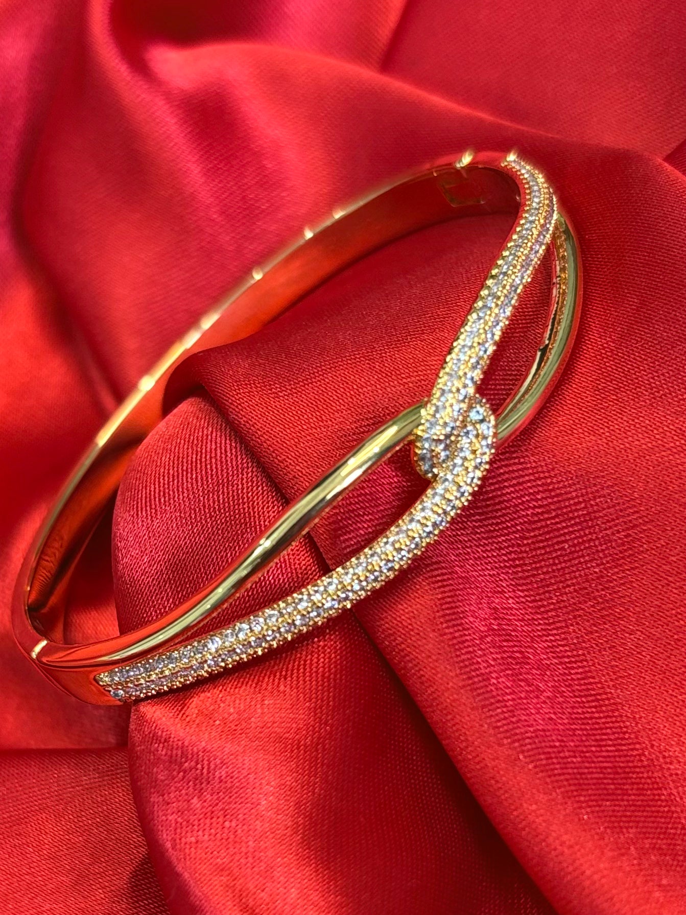 Gold tone kate infinity hinged With cubic zirvonia Bangle