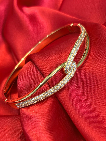 Gold tone kate infinity hinged With cubic zirvonia Bangle