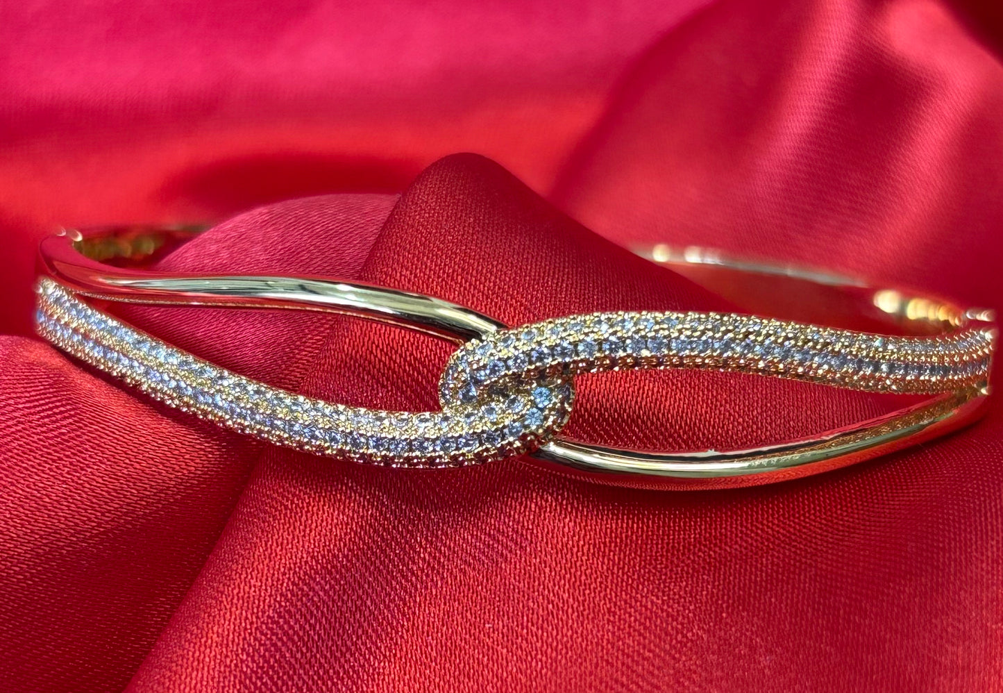 Gold tone kate infinity hinged With cubic zirvonia Bangle