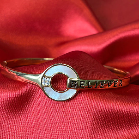 Gold Tone Circular Charm With BELIEVER Bangle