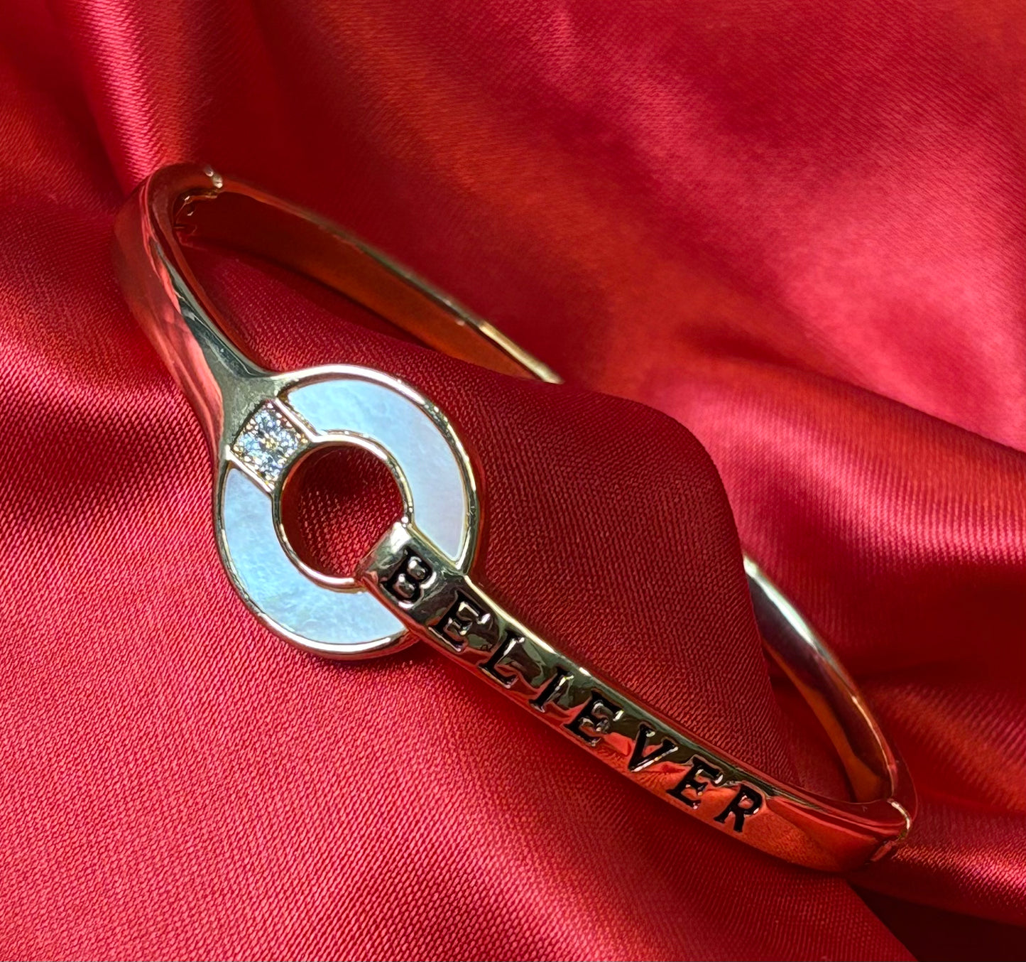 Gold Tone Circular Charm With BELIEVER Bangle