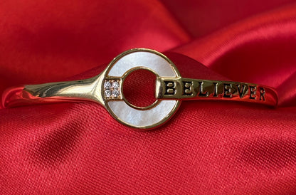 Gold Tone Circular Charm With BELIEVER Bangle