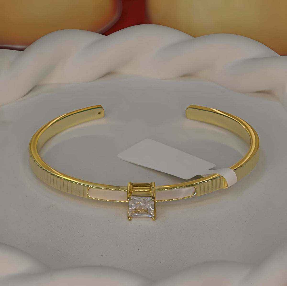 Gold-tone Princess Cut Center Stone Cuff Bangle