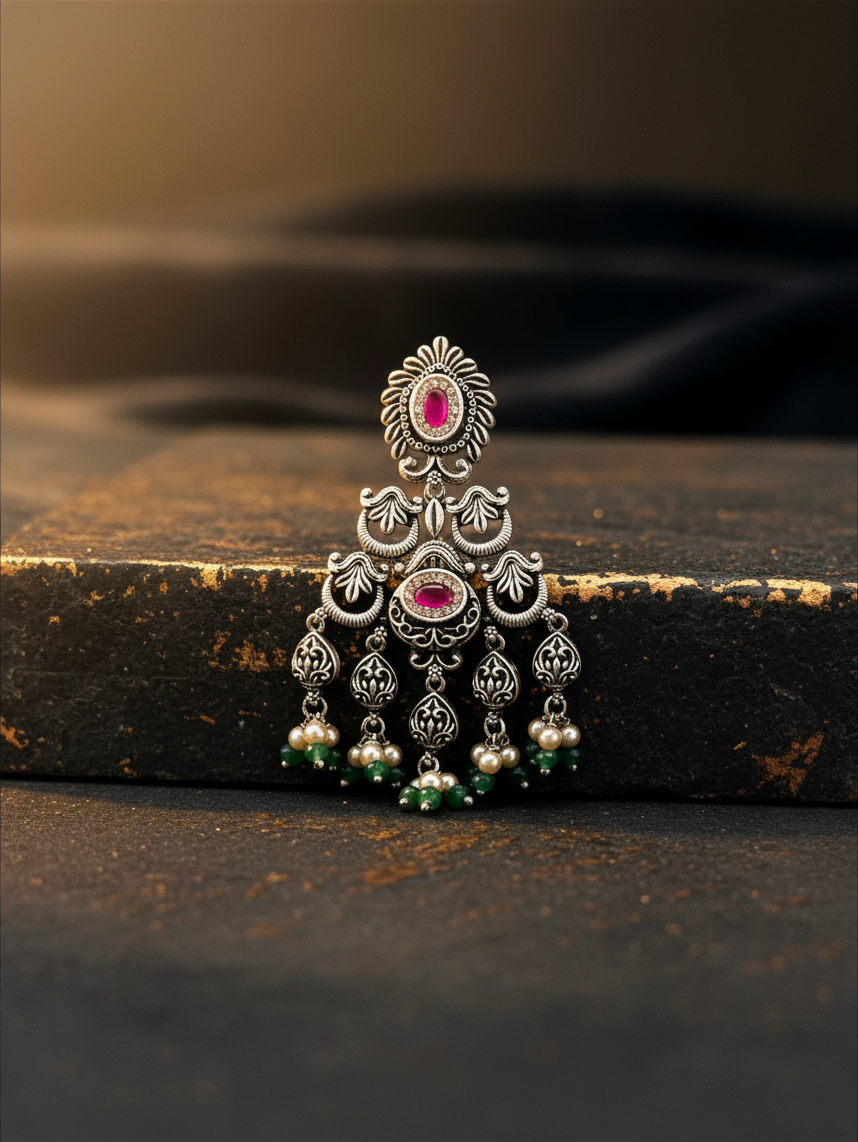 Aurevia Fashion Jewellery Jhansi Heritage silver earring with pink stones, pearl beads, and green accents.
