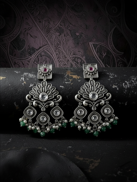 Aurevia Fashion Jewellery Jhansi Regal oxidized silver chandelier earrings with pink stones, white pearls, and green beads