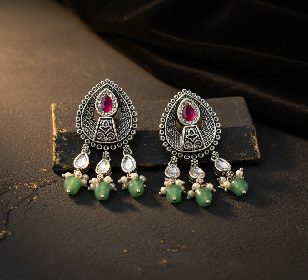 Aurevia Fashion Jewellery Jhansi Aura oxidized silver earrings with pink stones, white pearls, and green beads