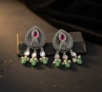 Aurevia Fashion Jewellery Jhansi Aura oxidized silver earrings with pink stones, white pearls, and green beads