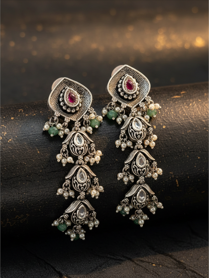 Aurevia Fashion Jewellery Jhansi Aadhya oxidized silver drop earrings with ruby, green beads, and pearl accents.